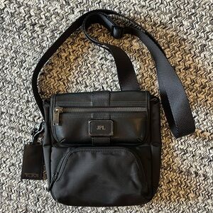 Tumi Alpha Bravo Brattan Ballistic Nylon/Leather Crossbody Travel Bag – Black